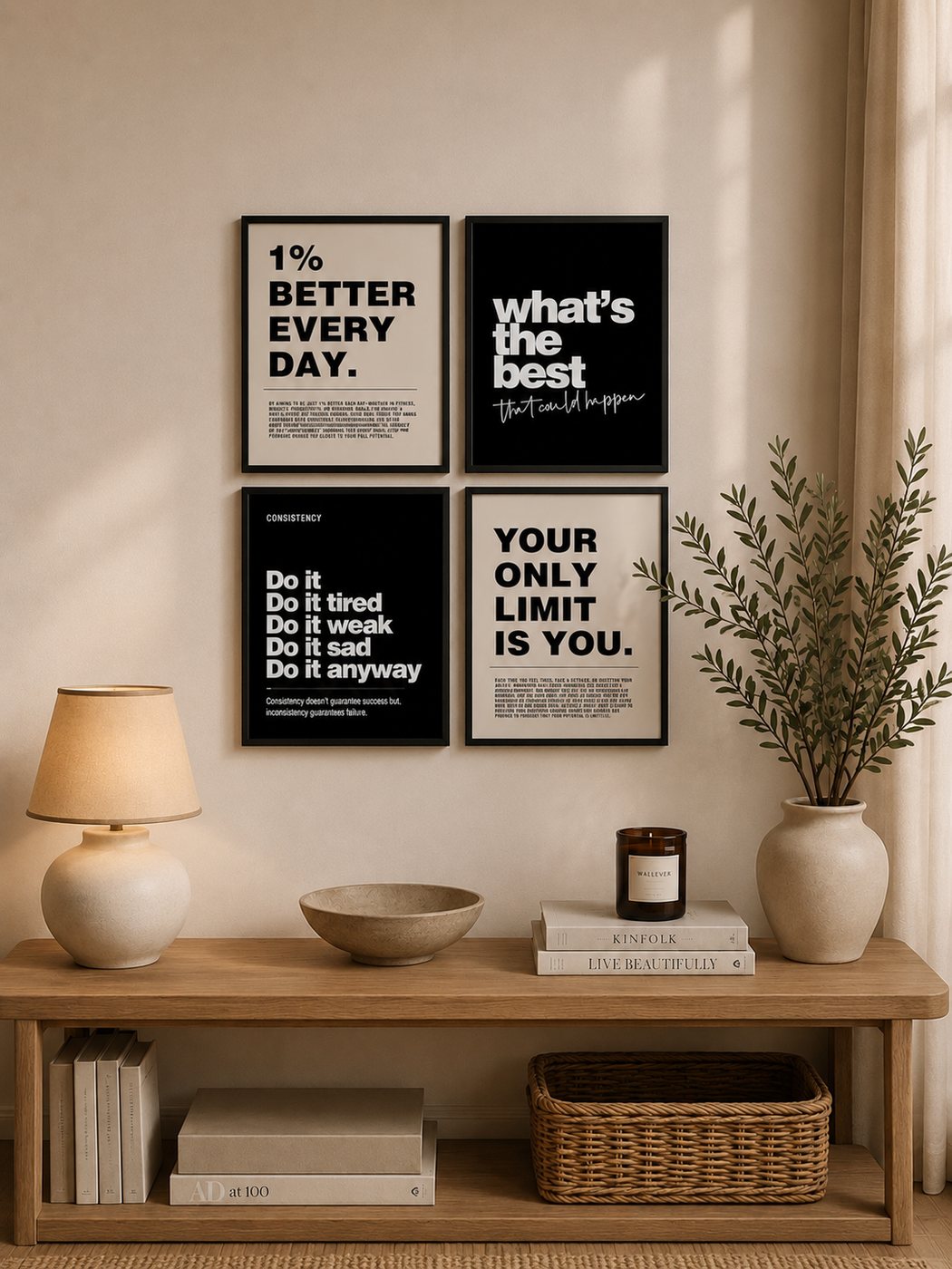 Four framed prints above a console table